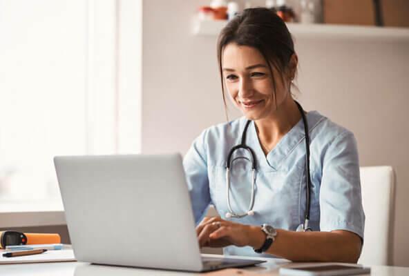 woman reading about healthcare marketing trends