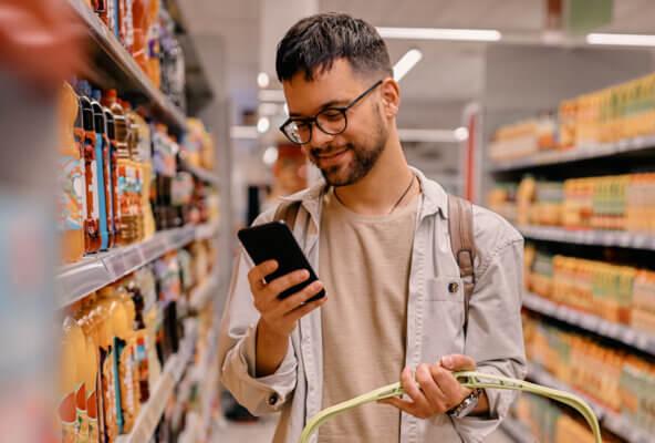 Person looks at digital intake forms on smartphone as part of patient consumerism