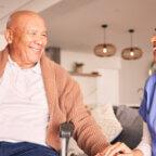 Medical professional works with patient during patient experience week celebrations