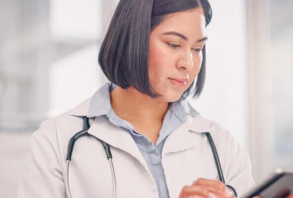 physician using EHR or EMR
