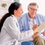 Physician and patient discuss Men's Health Month as part of June healthcare observances