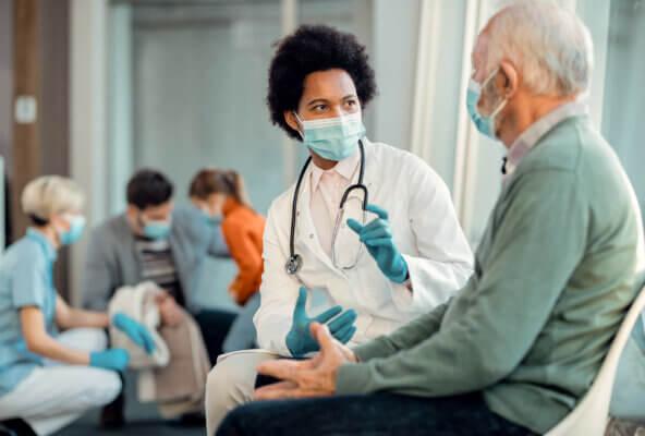 Medical professional works with patients amid staffing shortages in healthcare