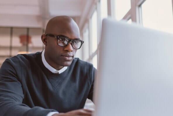 Healthcare professional reads about licenses to start your own medical business