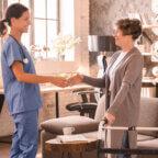 Healthcare provider implements March 2025 healthcare marketing ideas while shaking hands with patient