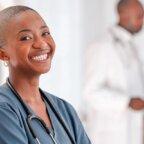 smiling doctor who uses AI medical scribe transcription