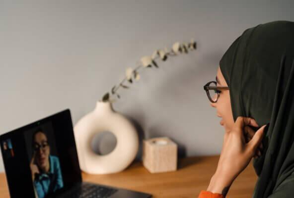 a therapist and patient on a telehealth therapy video call